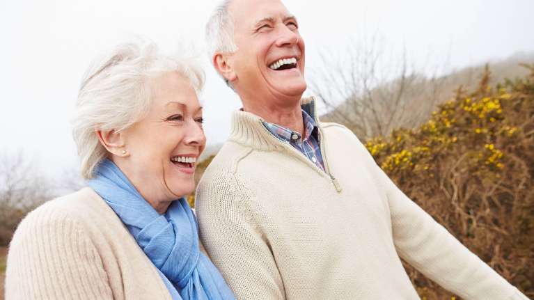 couple with dental implants in brisbane