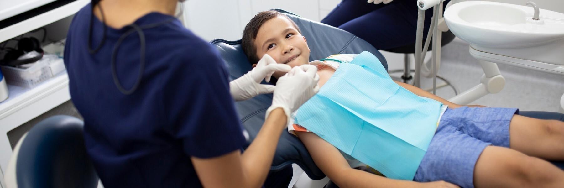 little boy during dental exam in highgate hill