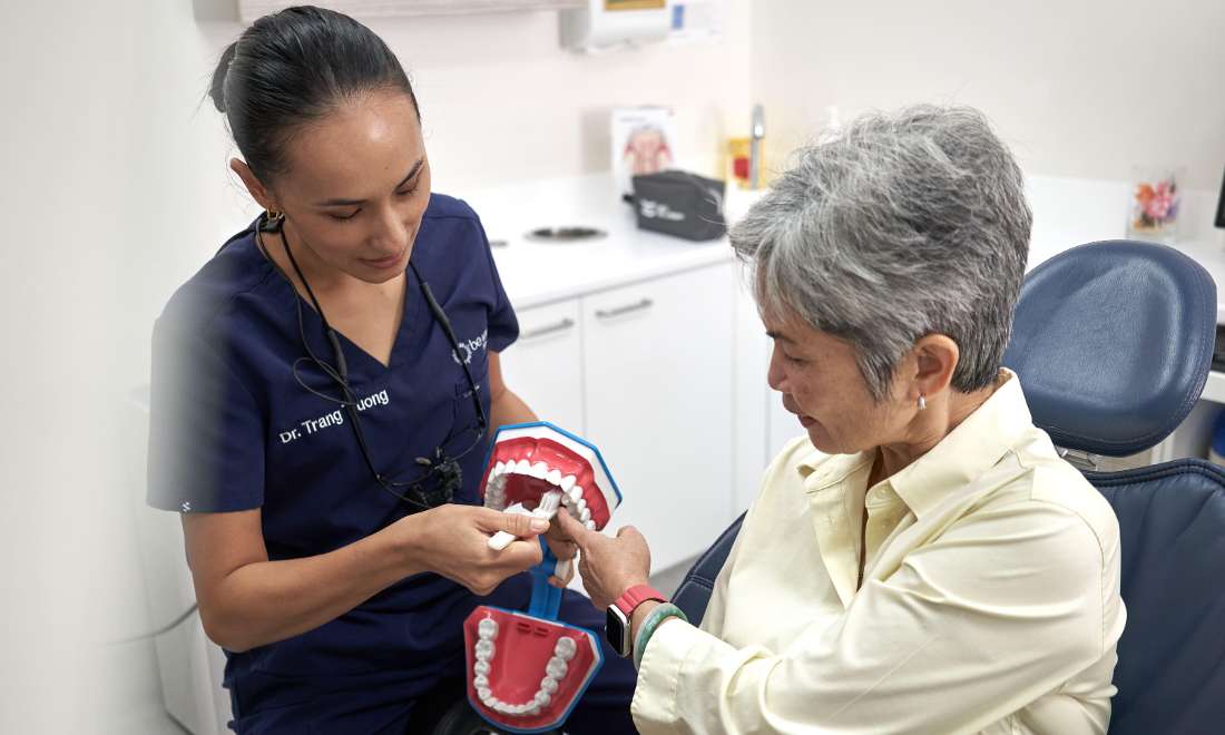 Dr Trang showing correct brushing technique